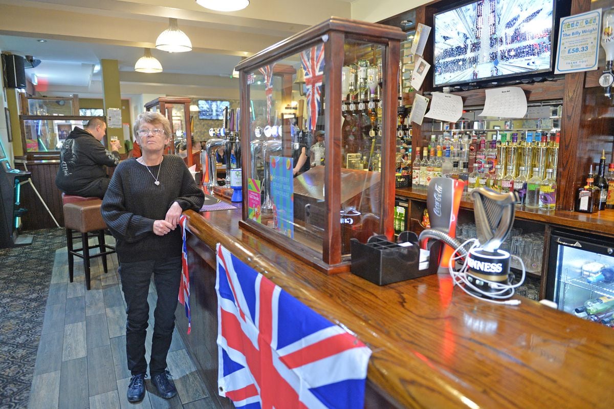 Liz Roden watching Queen's funeral at the Billy Wright pub, Wolverhampton