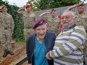 Veteran Victor Clarke has died aged 100. Here he is celebrating his 100th birthday with his guard of honour and his nephew Geoff Rogers.
