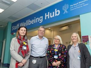 Jo Flavell, Health & Wellbeing Specialist, Prof. David Loughton CBE, Group Chief Executive, Amanda Winwood, RWT Charity Development Manager, and Julie Smith, who is part of the Domestics team assisting in the Staff Wellbeing Hub, pictured outside the new Hub at New Cross Hospital.