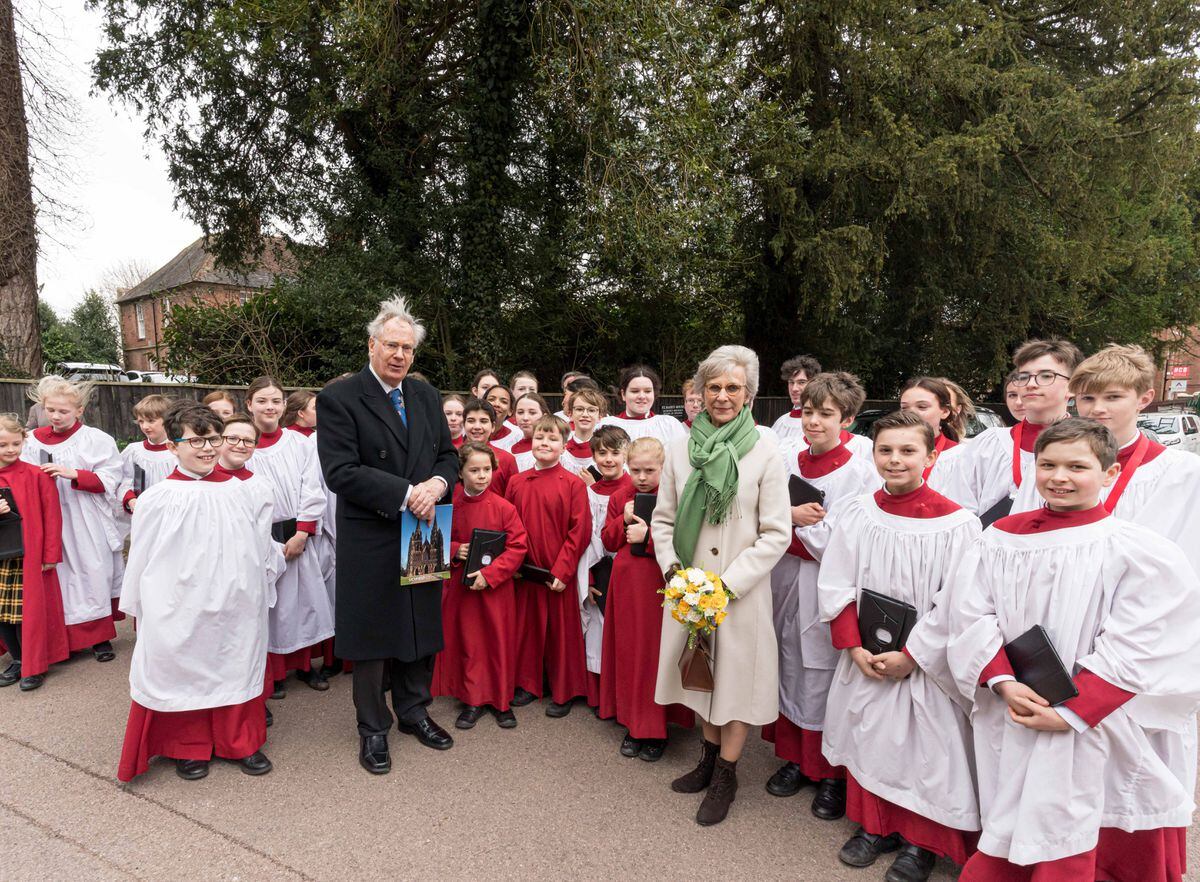 The Duke and Duchess pose with some of the choristers from the cathedral. Photo: Chris Lockwood