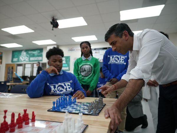 Prime Minister Rishi Sunak is shown a 3D printed chess set during a visit to the Friendship Technology Preparatory High School during his visit to Washington DC in the US