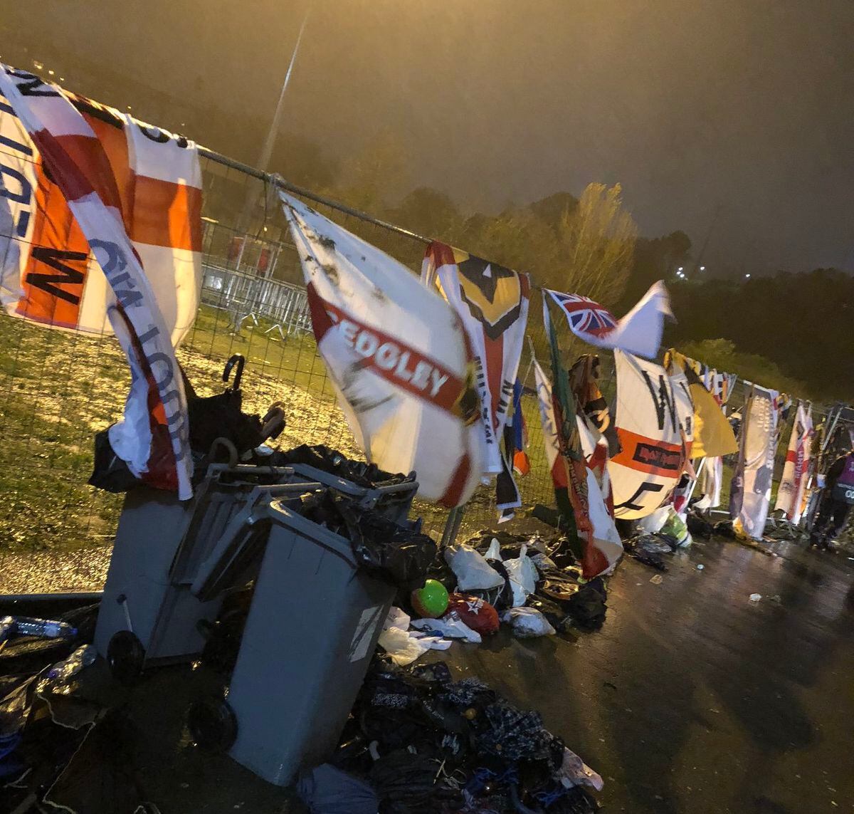Wolves stewards hung up flags they retrieved from bins after they were confiscated by local security