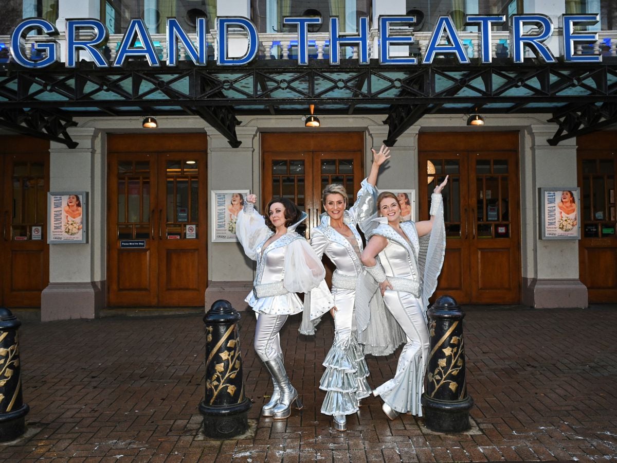 The Dynamos, stars of Mamma Mia! in costume outside the Wolverhampton Grand Theatre. Photo: Alex Styles