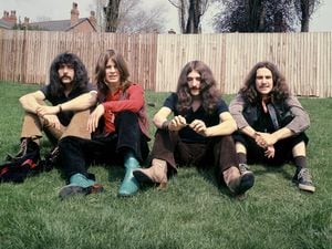Black Sabbath during their early years outside Jim Simpson's home in Edgbaston Photo: Jim Simpson