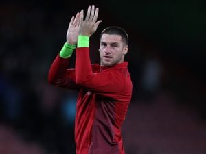 Albion's Sam Johnstone applauds the travelling fans at Bournemouth (AMA)