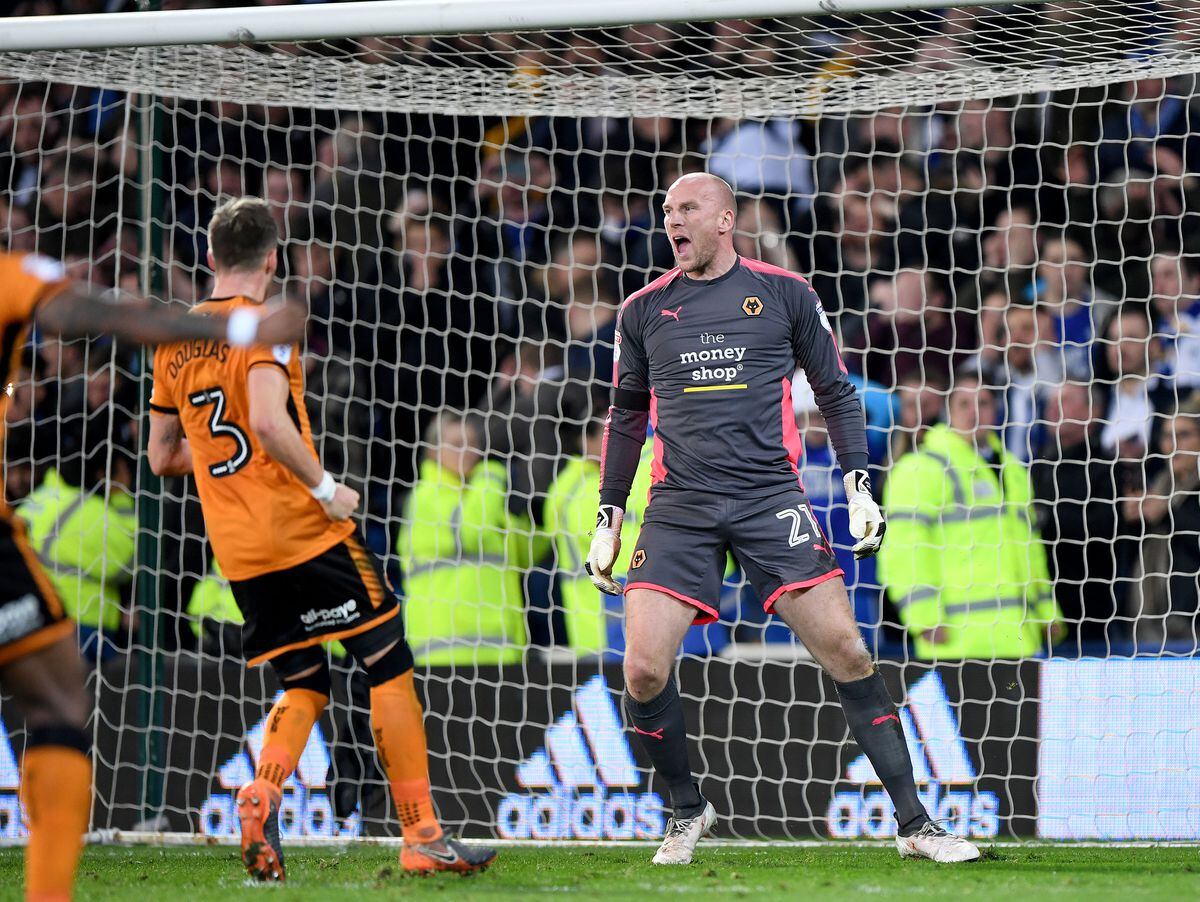 John Ruddy of Wolverhampton Wanderers reacts after saving a penalty.