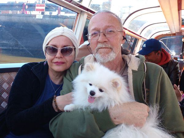 Mike Haley and his wife wife Alla, with their pet Pomeranian Archie