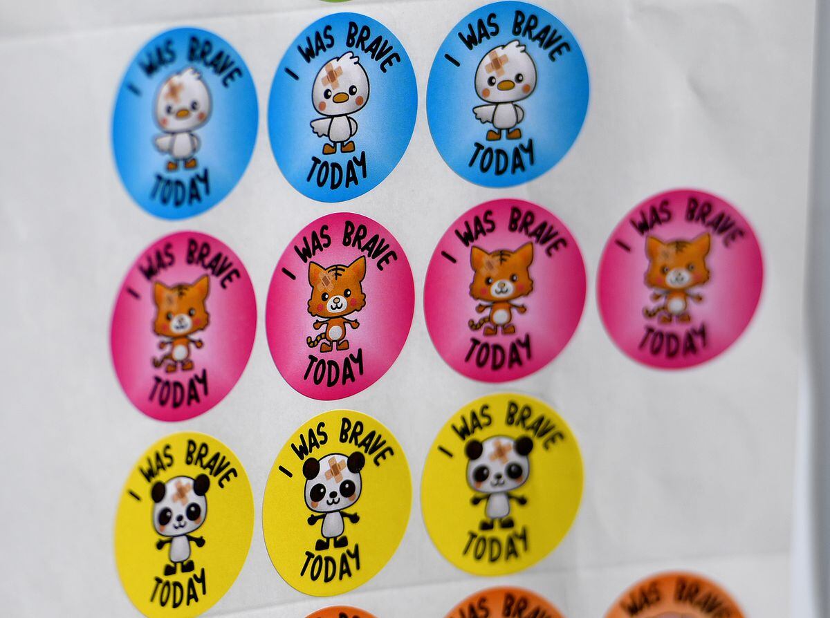 Children getting their jabs were able to say they had been brave with a sticker