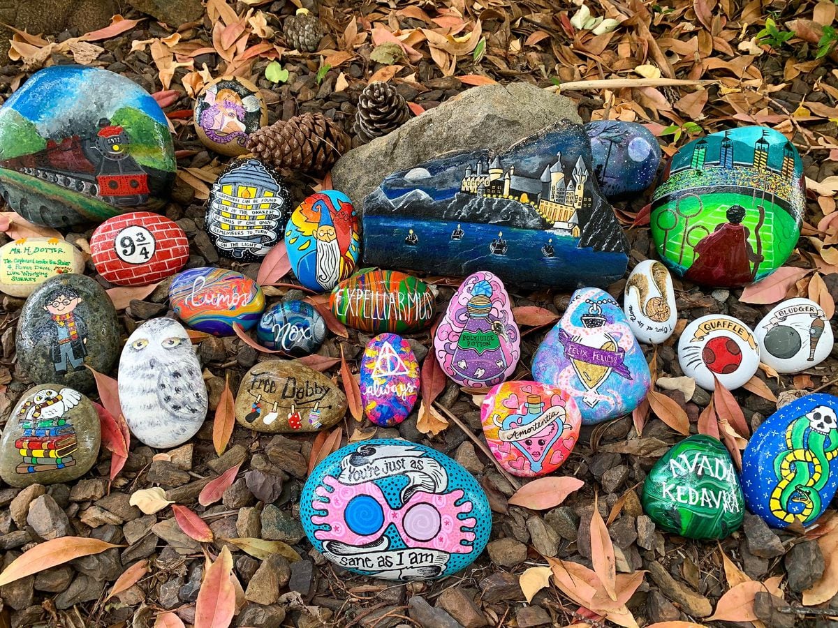 Kristen Newman's Harry Potter rock garden, with stones painted in a Harry Potter theme