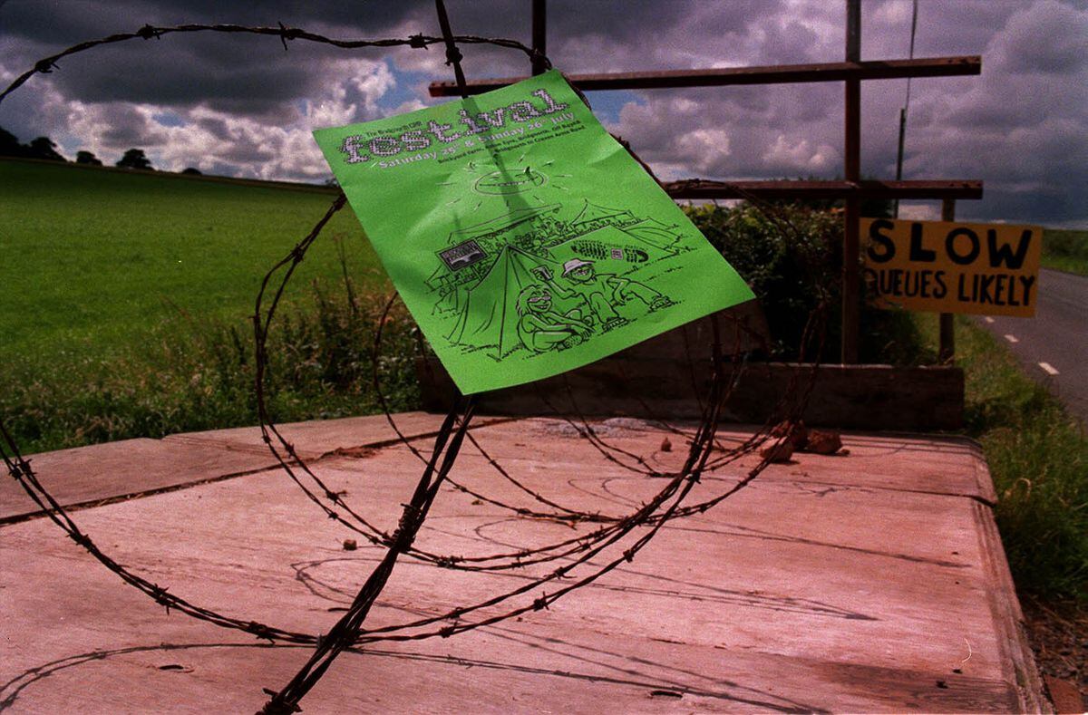 This unhappy farmer blocked his field with trailers and barbed wire. A leaflet for the festival blows in the wind.