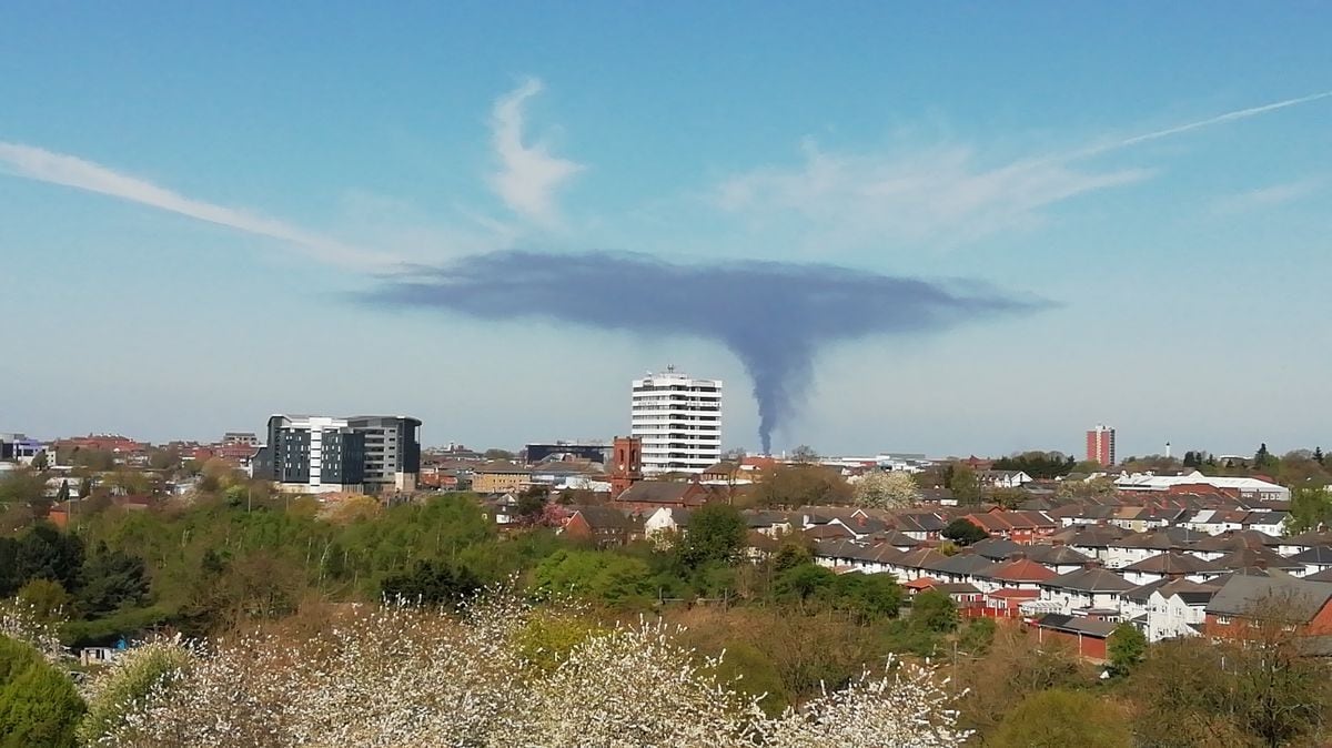 Smoke from the Willenhall fire seen from a tower block in West Bromwich. Photo: Rob Adams