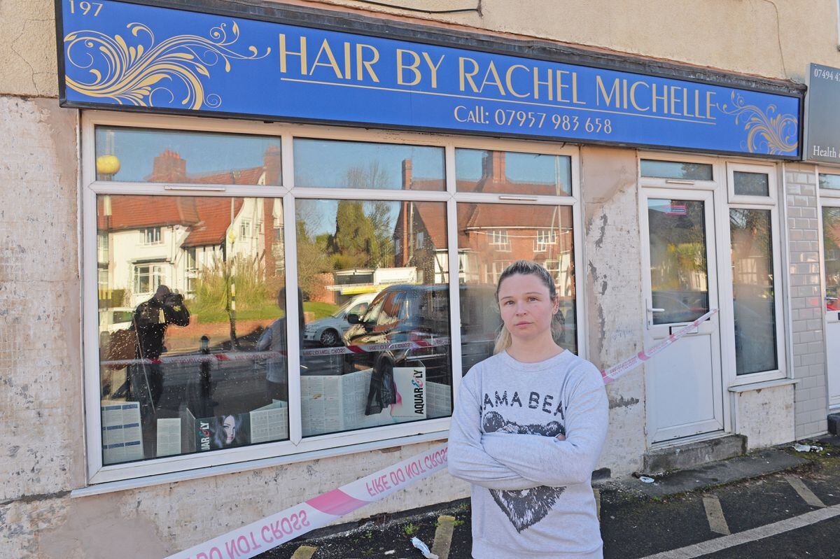 Rachel Oliver outside her damaged shop