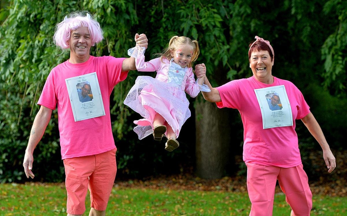 Bella Richards, five, with Tom and Dianne Caddick from Wolverhampton