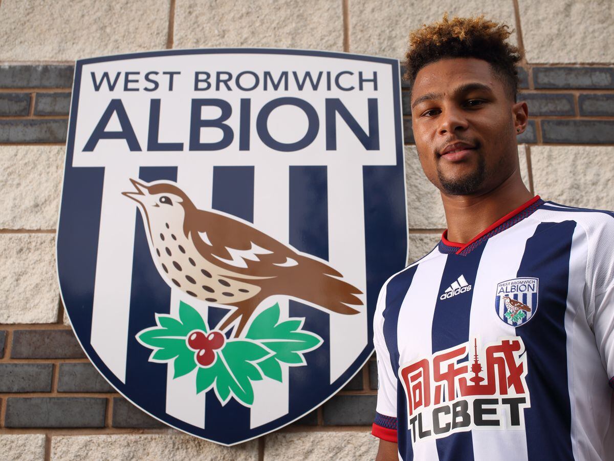 Serge Gnabry after signing for Albion (Photo by Matthew Ashton - AMA/Getty Images).