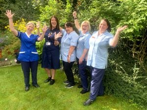 Members of staff at Katherine House celebrate Katharine House Hospice being nominated for Best UK Employer