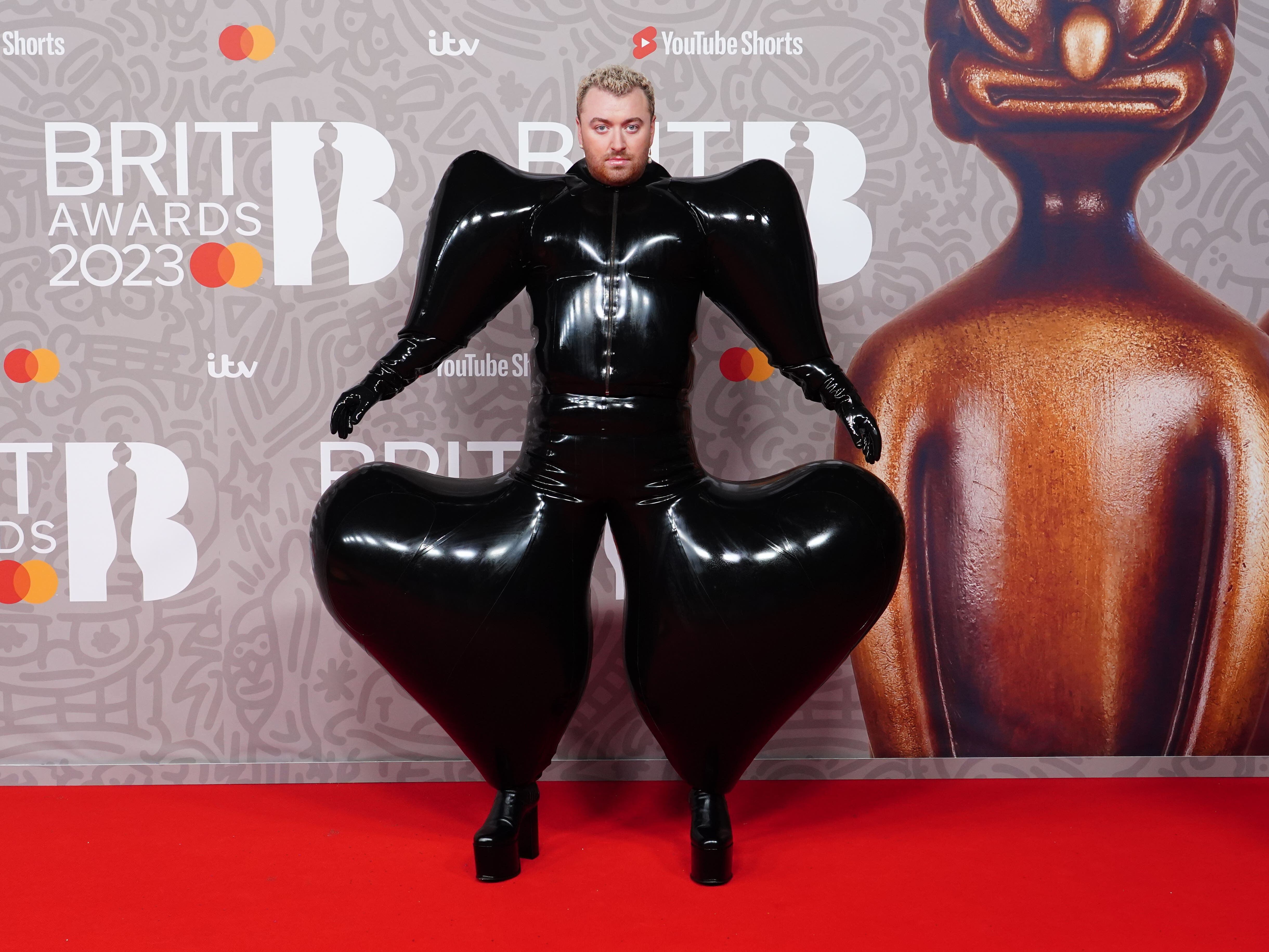Sam Smith dons latex bodysuit for Brits red carpet dominated by black outfits