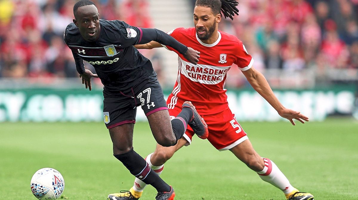 Albert Adomah escapes the attentions of Ryan Shotton.