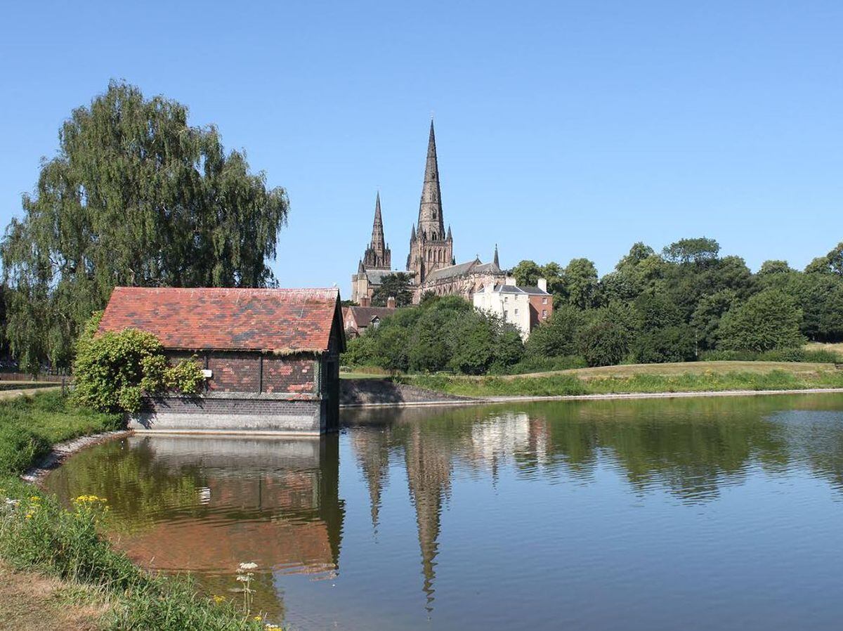 The man was spotted in difficulty in the water at Stowe Pool near Lichfield Cathedral