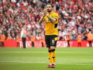 LIVERPOOL, ENGLAND - MAY 22: Ruben Neves of Wolverhampton Wanderers shows appreciation to the fans following defeat in the Premier League match between Liverpool and Wolverhampton Wanderers at Anfield on May 22, 2022 in Liverpool, England. (Photo by Jack Thomas - WWFC/Wolves via Getty Images).