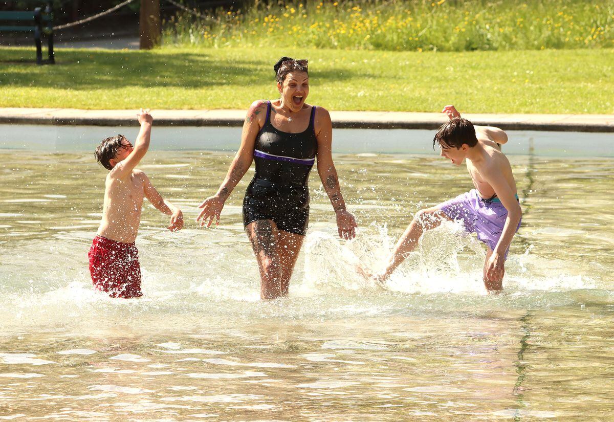 Emma Leneveu from Woodside, Telford, enjoying the sunshine at Tettenhall Pool with sons Leo, six, and Kristian, 13