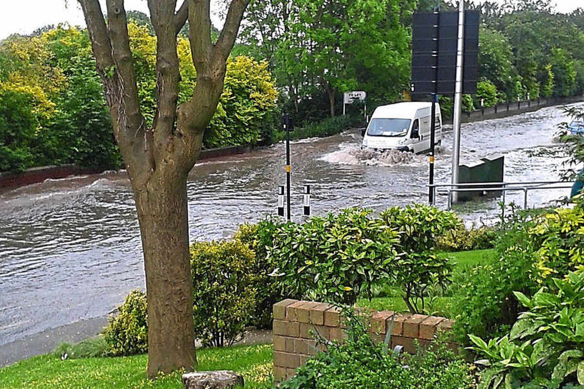 Burst water pipe turns Black Country road into raging river