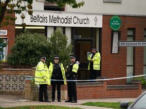 Police outside Belfairs Methodist Church in Leigh-on-Sea, Essex, where Conservative MP Sir David Amess was fatally stabbed