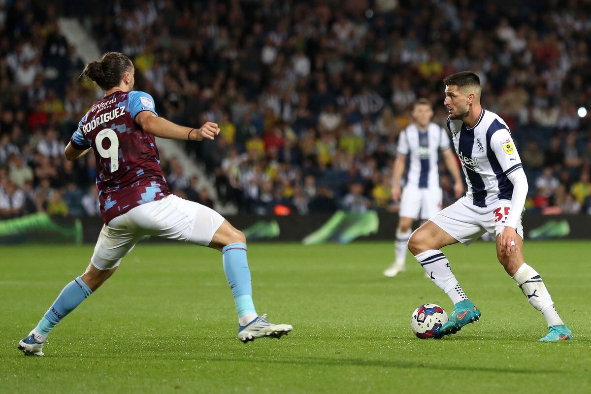 WEST BROMWICH, ENGLAND - SEPTEMBER 03: Okay Yokuslu of West Bromwich Albion and Jay Rodriguez of Burnley during the Sky Bet Championship between West Bromwich Albion and Burnley at The Hawthorns on September 3, 2022 in West Bromwich, United Kingdom. (Photo by Adam Fradgley/West Bromwich Albion FC via Getty Images).