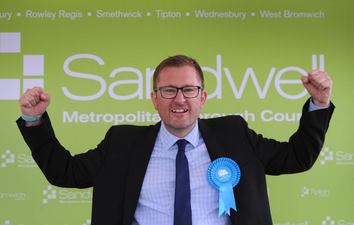 Scott Chapman celebrates his win for the Conservatives in Friar Park
