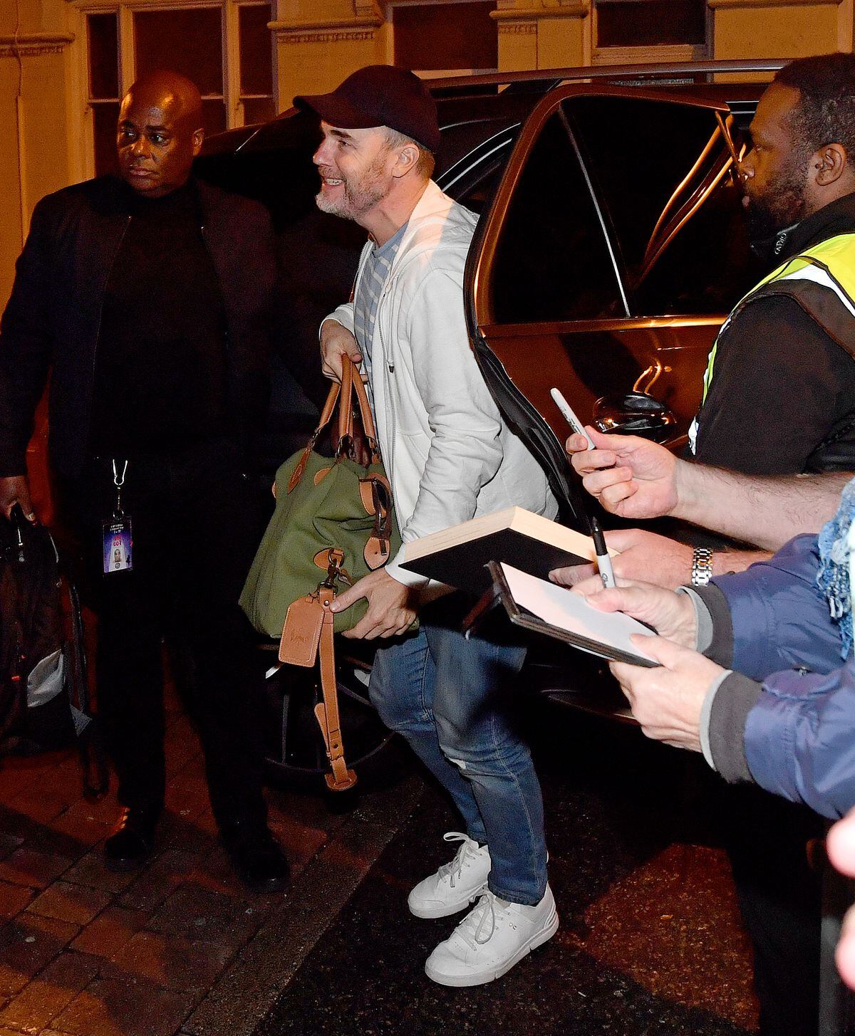 Gary Barlow arrives to cheers from the fans who waited outside for him