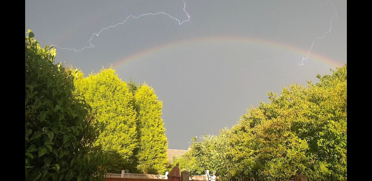 Rainbow and lightning pictured in Coseley by Laura Haynes