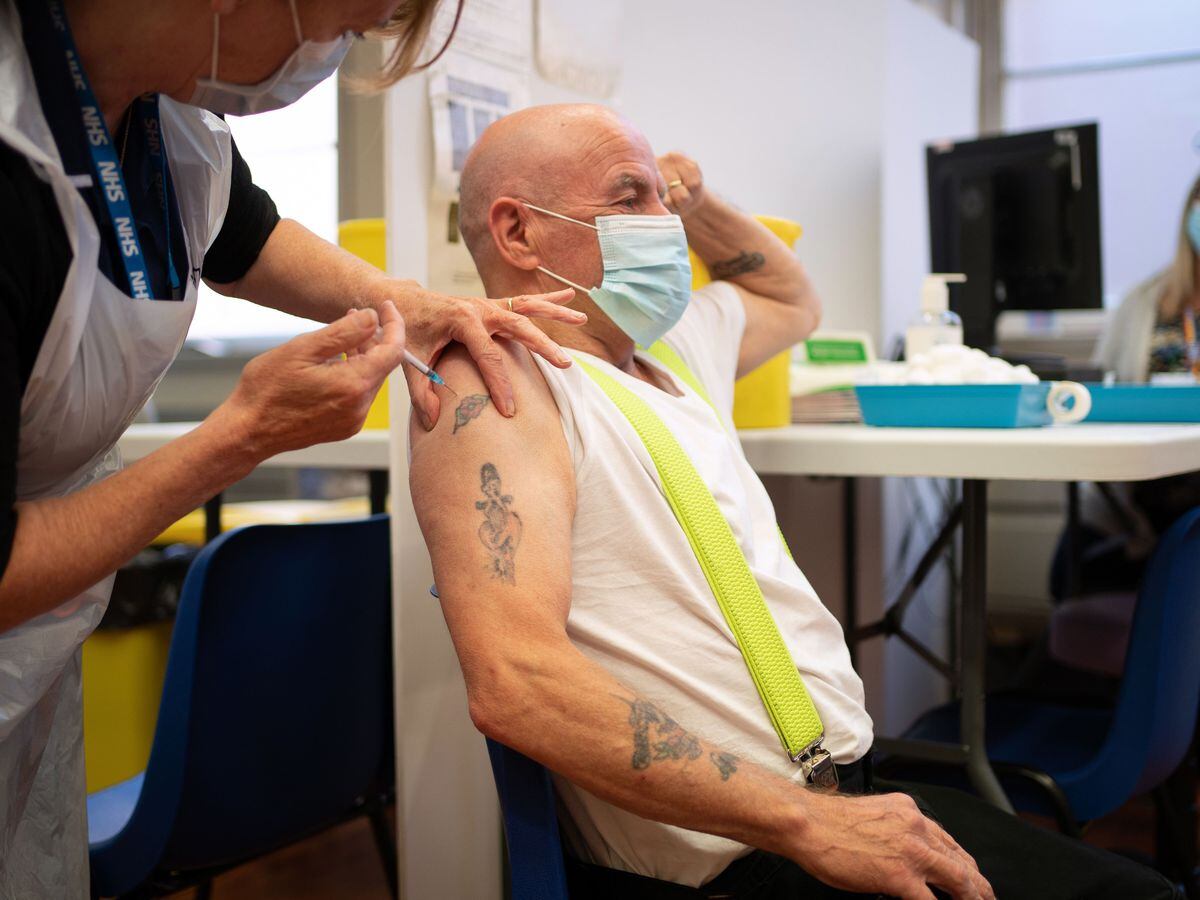 People receive Covid-19 booster vaccinations at Midland House, Derby (Joe Giddens/PA)