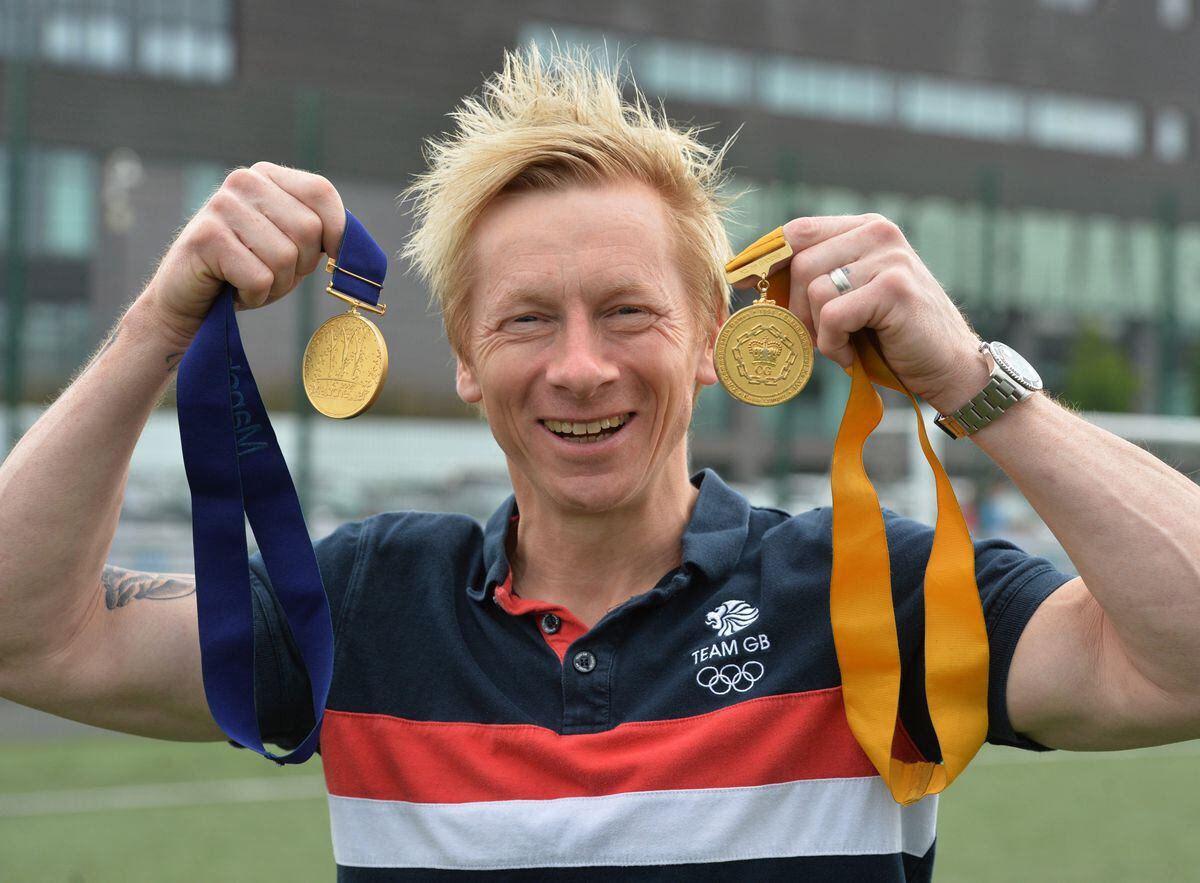 Craig Heap with his Commonwealth Games medals  