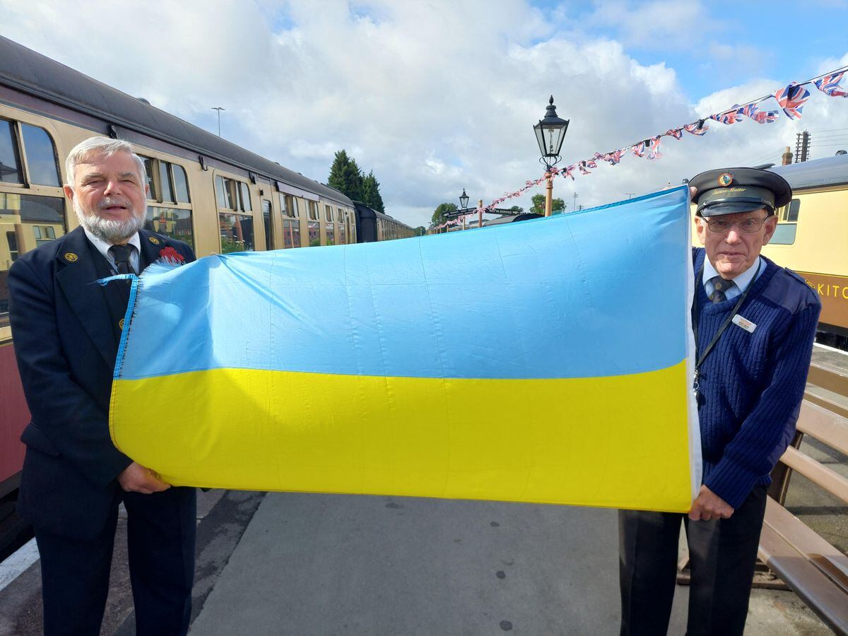 Volunteers Richard Cresswell and Geoff Smith fly the flag for Ukraine at the SVR. Photo: Dan Shorthouse.