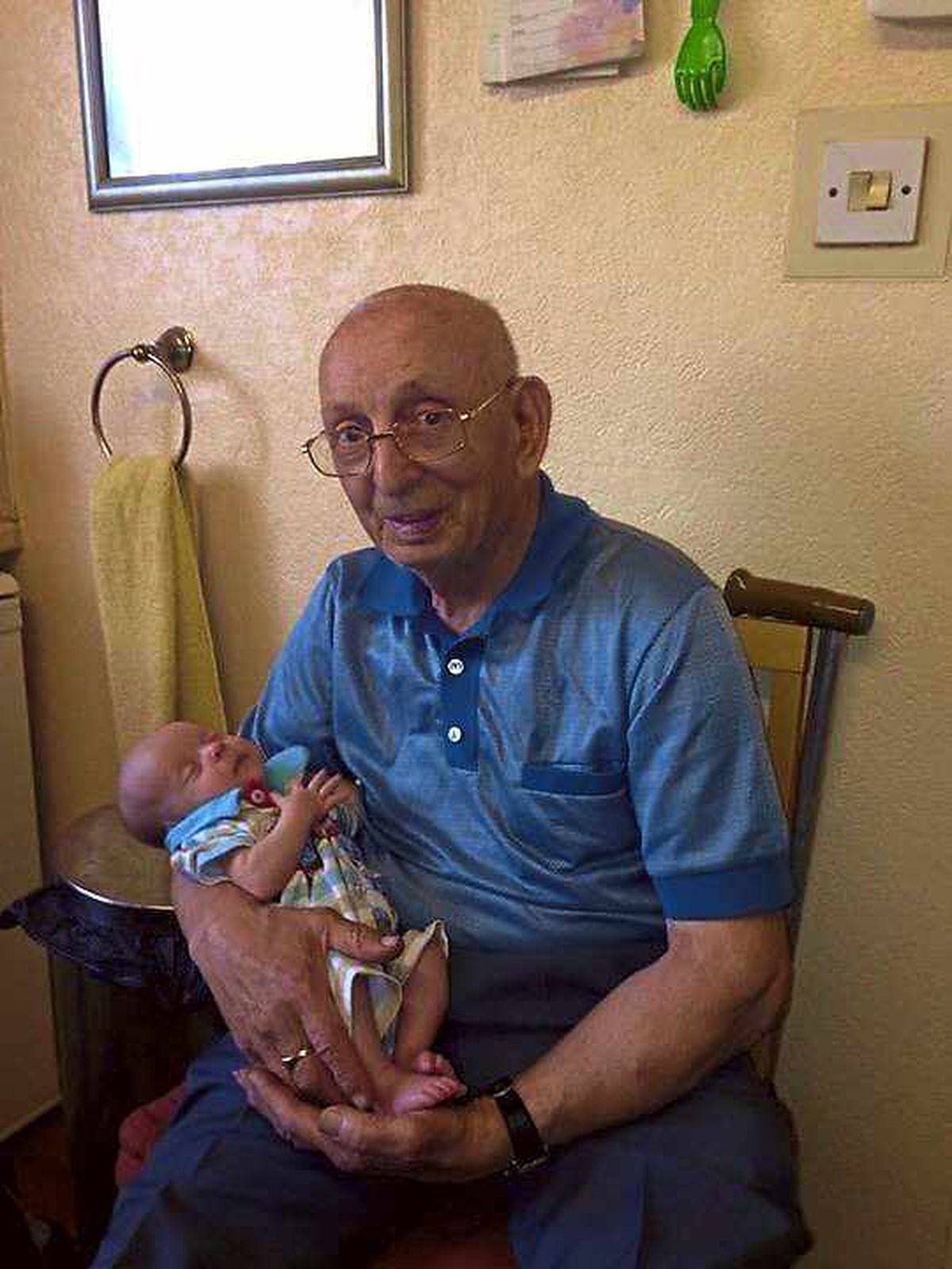 A family photo of Mr Edlin with great-great grandson Harry, aged one