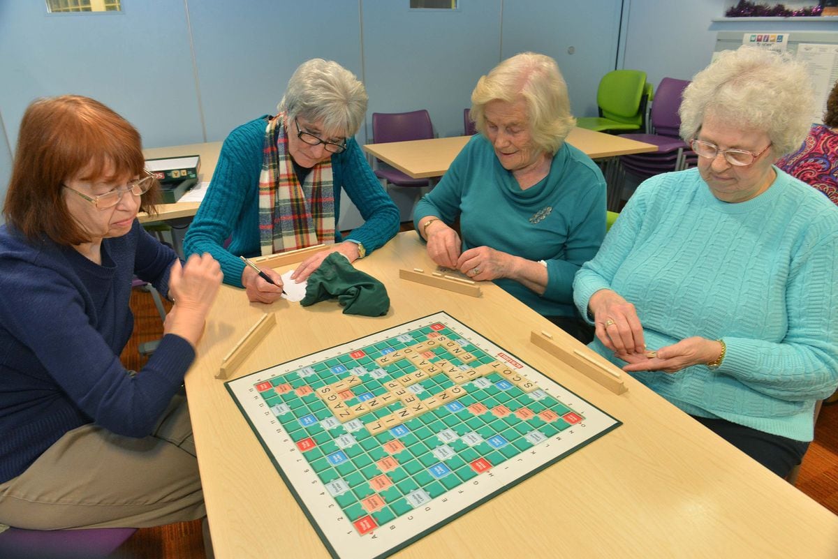 L-R: Barbara Betts, Carole Green and Sheila Brueton and Beryl Smith enjoy a game of scrabble at Blackheath Library High St, Rowley Regis