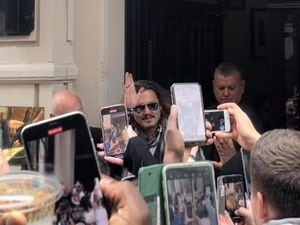 Johnny Depp outside the Grand Hotel in Colmore