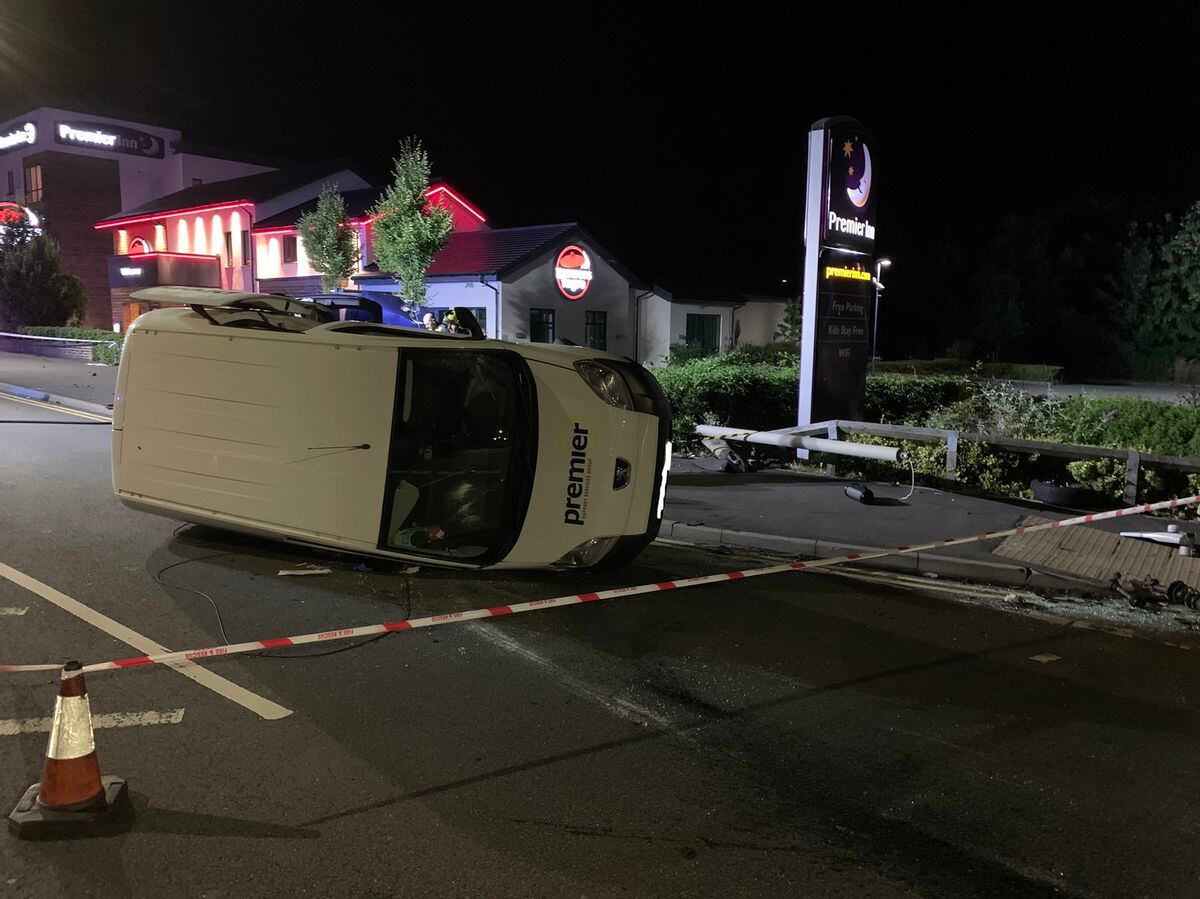 The van ended up on its side after colliding with a car outside Premier Inn in Stourbridge. Photo: @WMFSStourbridge