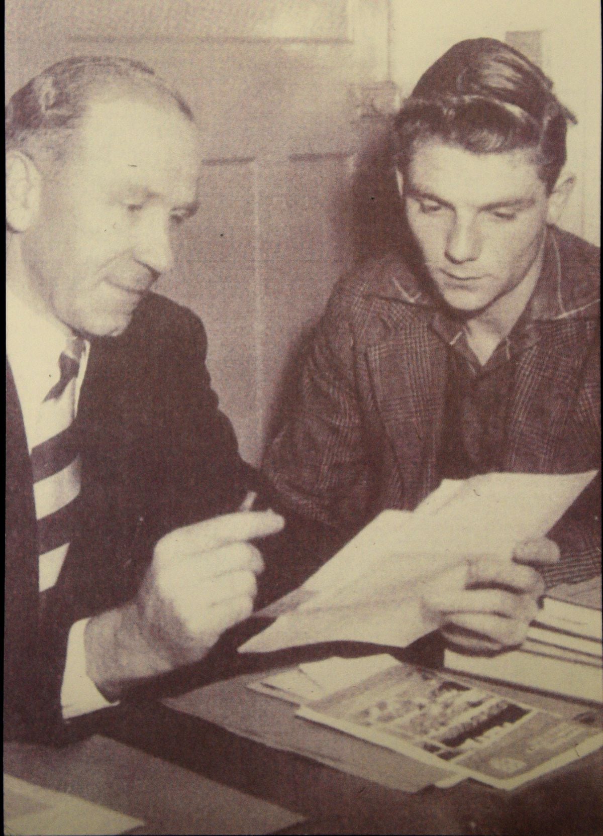 Duncan signing for Manchester United with manager Matt Busby