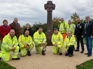At the restored Bradley War Memorial are, front row (from left) Highways operatives David Hodson, Damian Benn, Kevin Tinsley, Martyn Harper and Dave Onions, depot supervisor and back row (from left) Rev Kate Watson, St Martin’s Church, Slater St, Bradley; Councillor Stephen Simkins, deputy leader and cabinet member for city economy; Bilston East Councillor Jill Wildman; Nick Flukes, highways operative; Trevor Fletcher, works manager; Stephen Doran, Artistic Gardens of Walsall and Alan Degg, MD Hilton Main Construction Ltd.