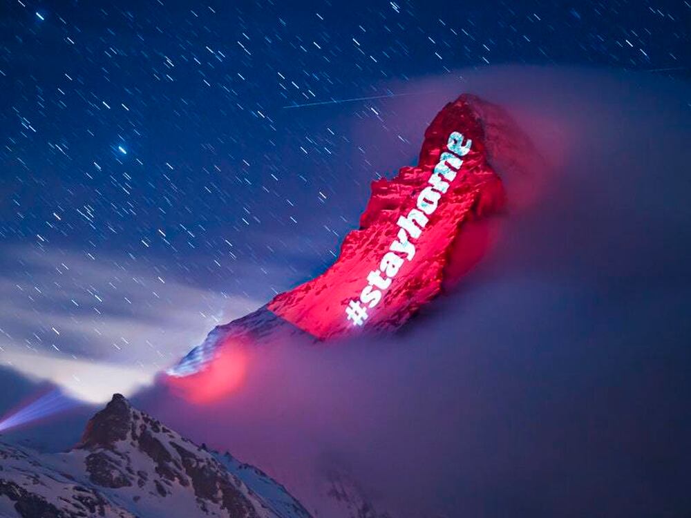 Switzerland's Matterhorn lit with messages of solidarity in coronavirus lockdown