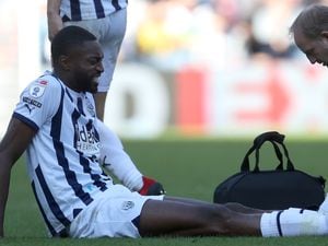 Semi Ajayi receives treatment late on against Millwall (Photo by Adam Fradgley/West Bromwich Albion FC via Getty Images).