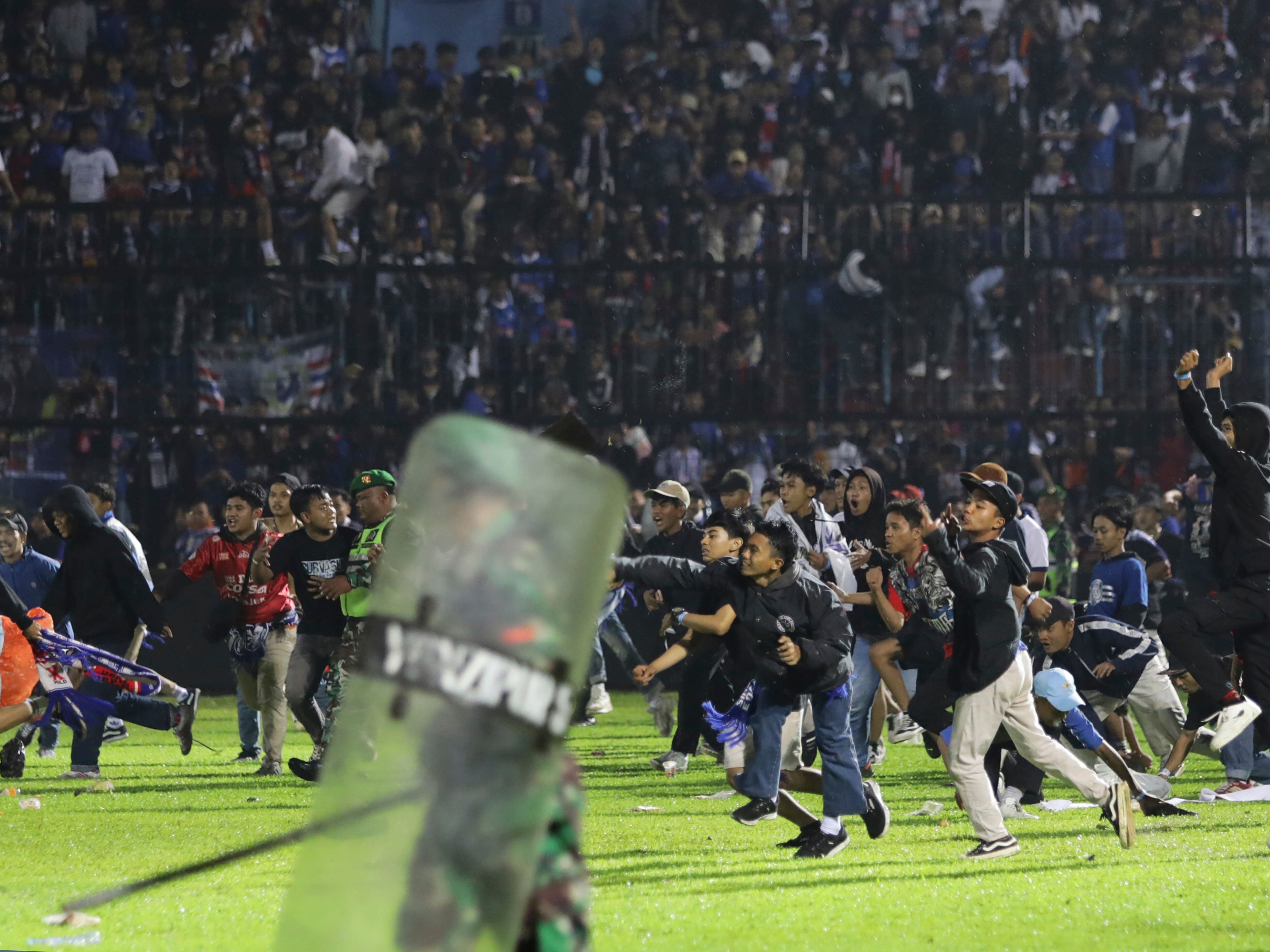 130 dead after stampede at Indonesian football match