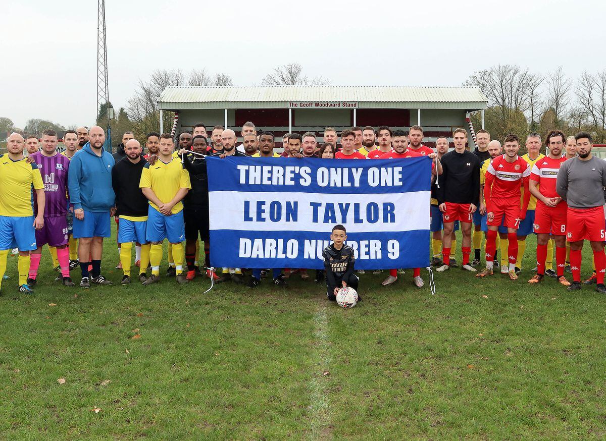 Charity football game in aid of Leon Taylor at Walsall Wood FC.  Walsall Wood v Darlaston Town.  Walsall Wood  and Darlaston Town players line up to show their repsect before kick off..