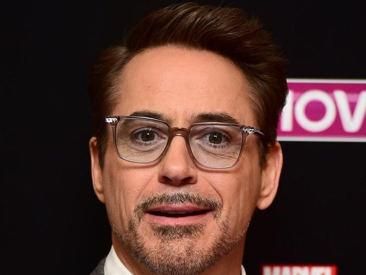 Robert Downey Jr warns fans of online scammers pretending to be him.