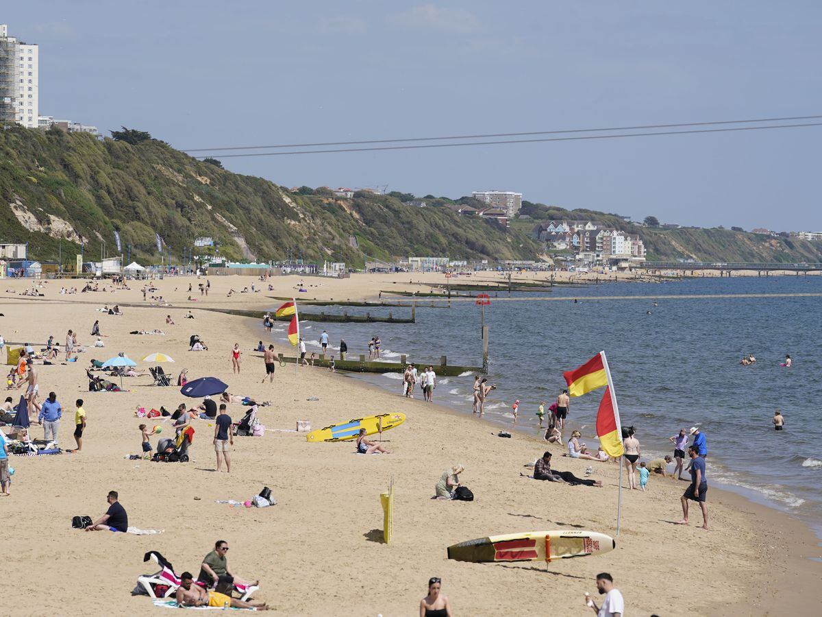 People enjoy the warm weather on Bournemouth beach in Dorset. Picture date: Thursday May 25, 2023