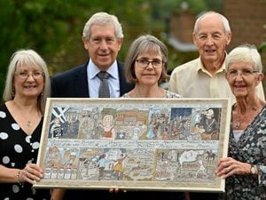 Artist Katy Alston has been capturing day centre visitors' treasured memories in paintings. Showing off the work, are from left, Karen Rawlings, Dennis Hill, Katy Alston , and David and Pauline Bird.