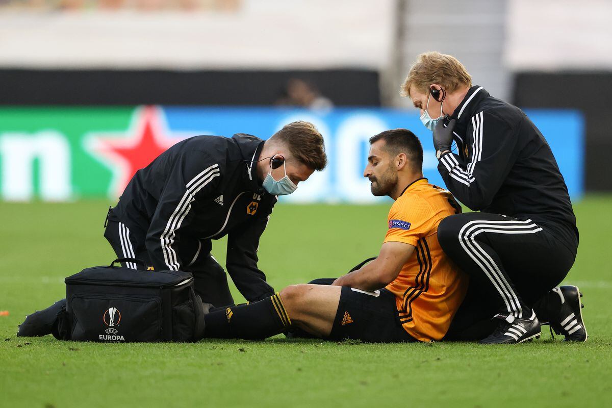 Jonny Otto of Wolverhampton Wanderers goes down injured (AMA)
