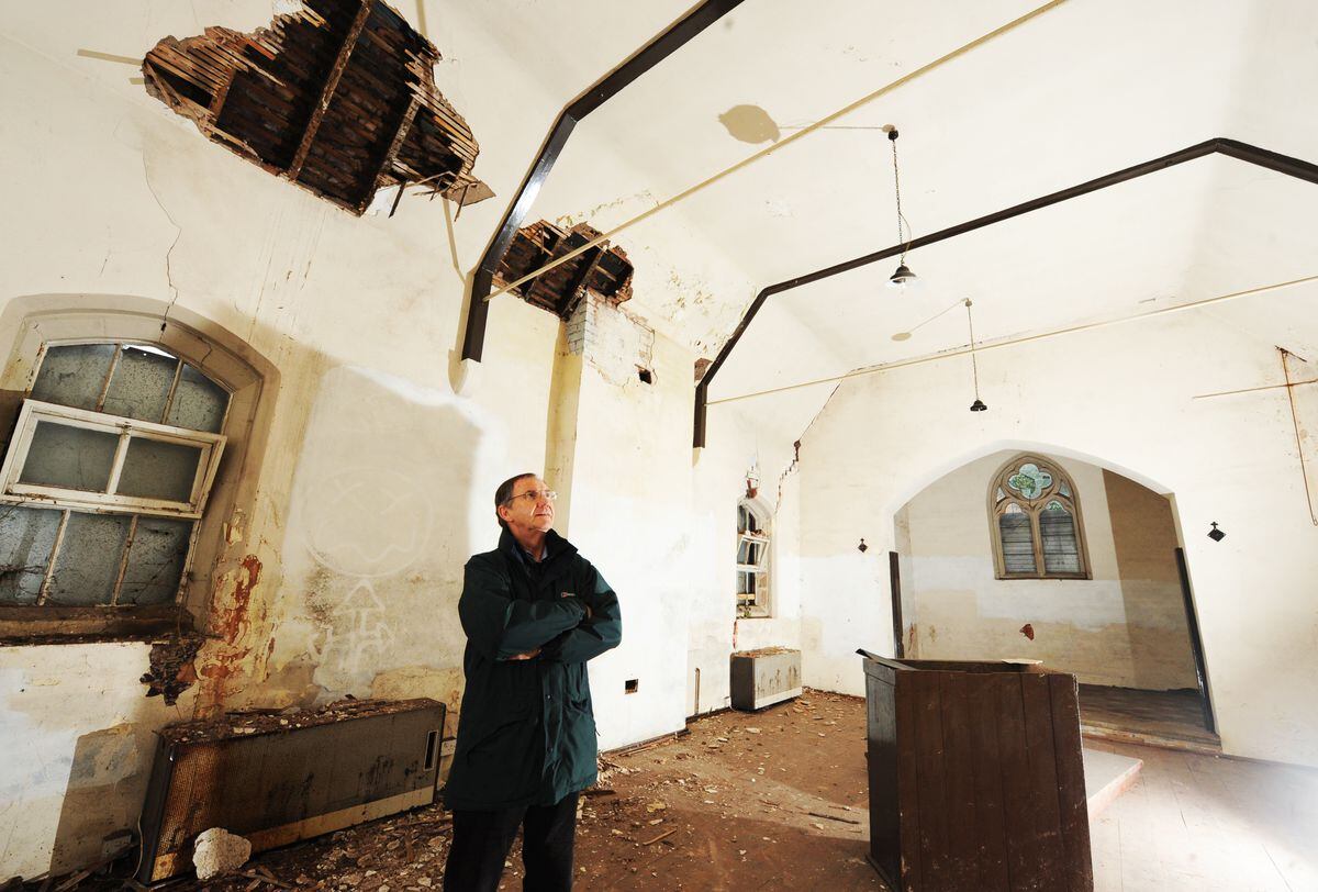 Terry Wilkes inside the derelict church 