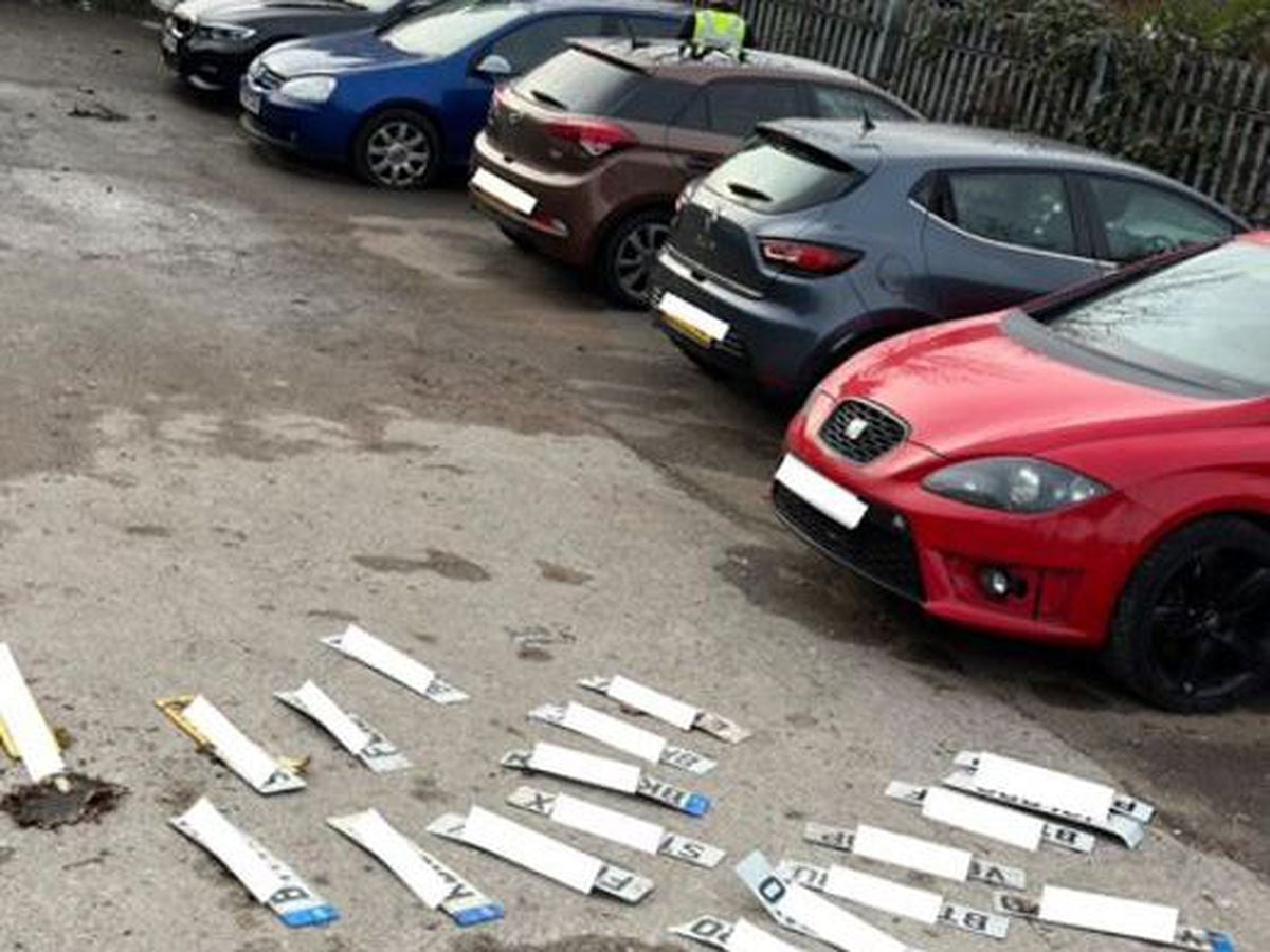 A large number of cars and licence plates were seized. Photo: West Midlands Police