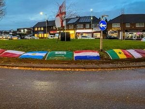 The flags are ordered together by the World Cup groups, with a big England flag in the middle. Photo: The New Pheasant Pub